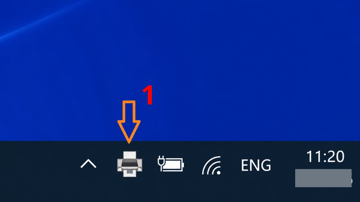 Ấn biểu tượng máy in trên Taskbar